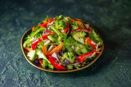 front-view-delicious-vegetable-salad-with-various-ingredients-dark-background 179666-47169